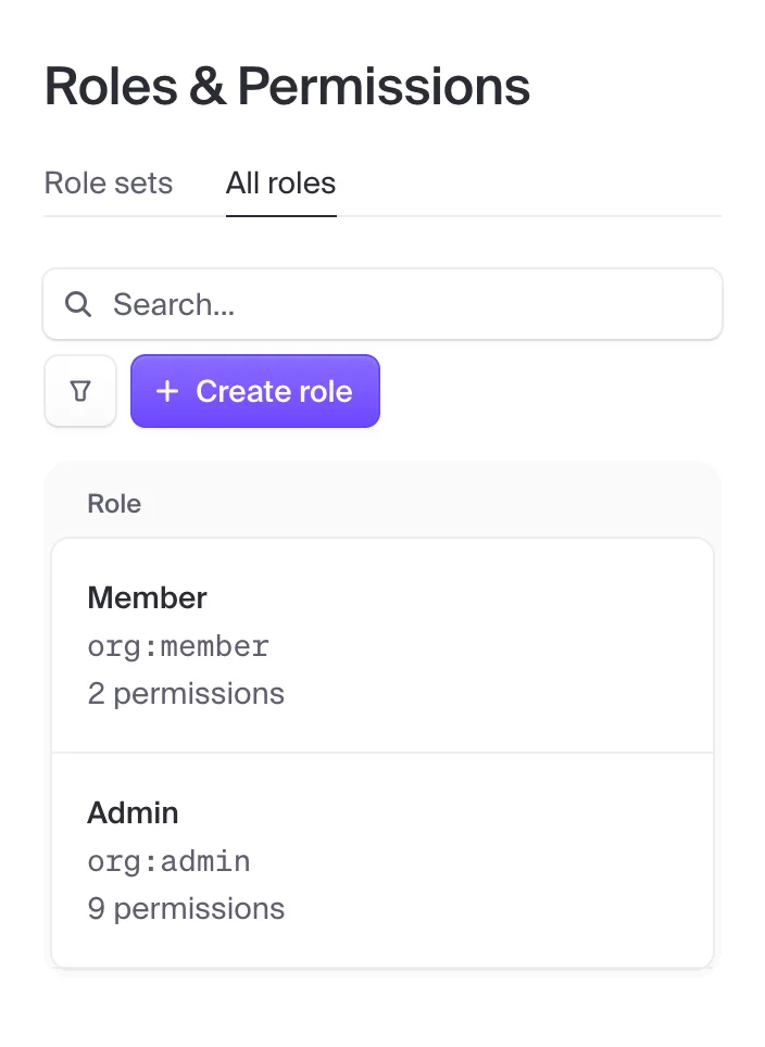 Clerk roles and permissions settings on a phone, listing each organization role with its key and permission count.